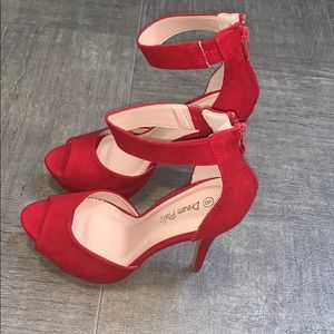 BRAND NEW only has been tried on Red high heels